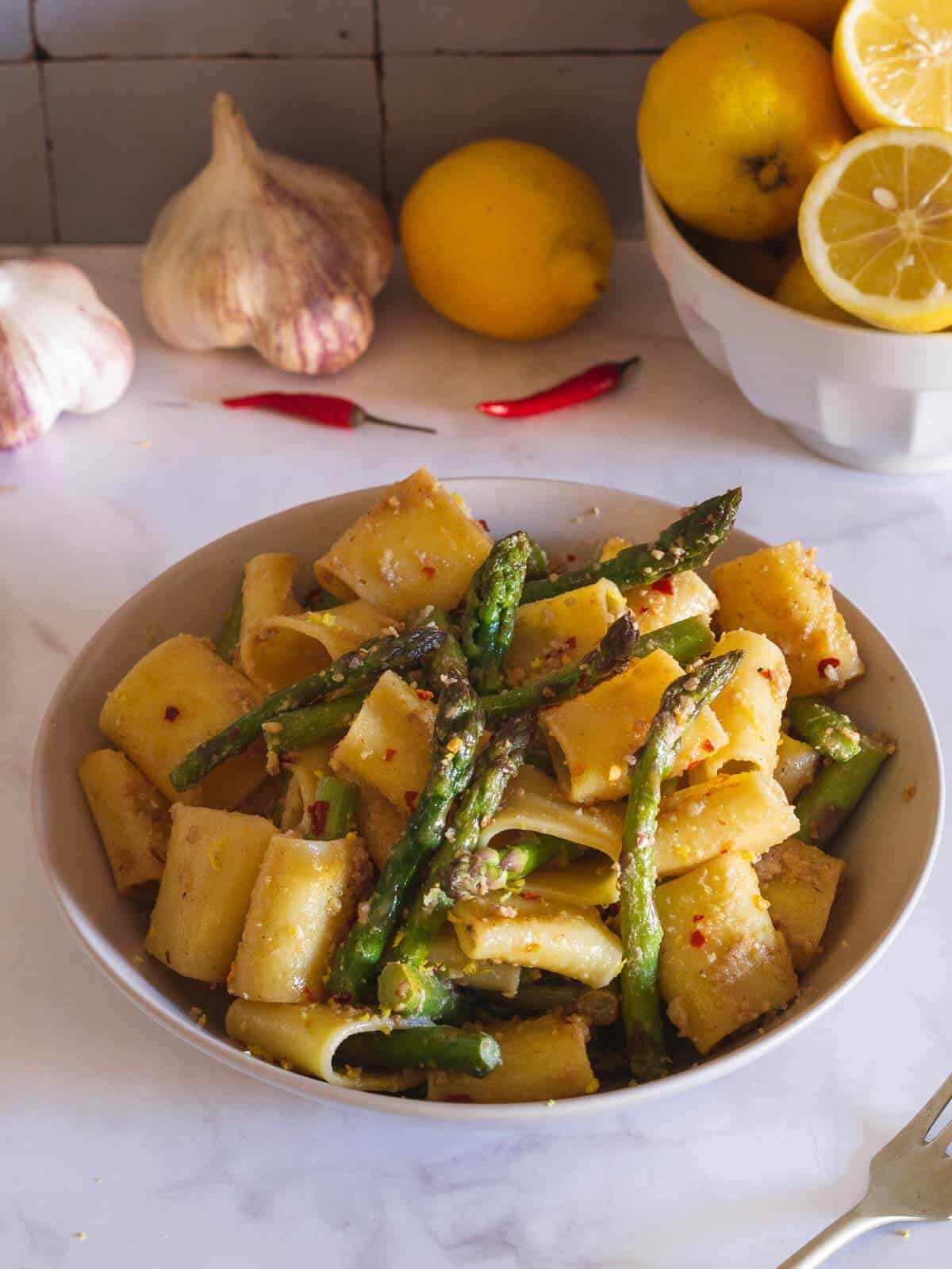 plate pasta with asparagus in a bowl